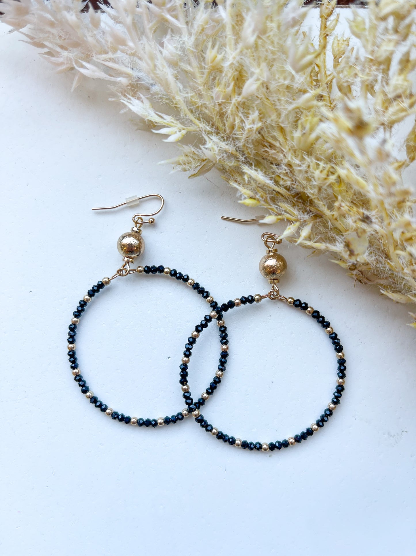 Black Crystal Hoop with Gold Ball 1.75" Earring